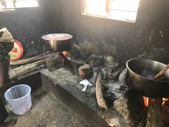 Conference size pots of beans and beef on the stove